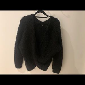 fuzzy cross cross sweater